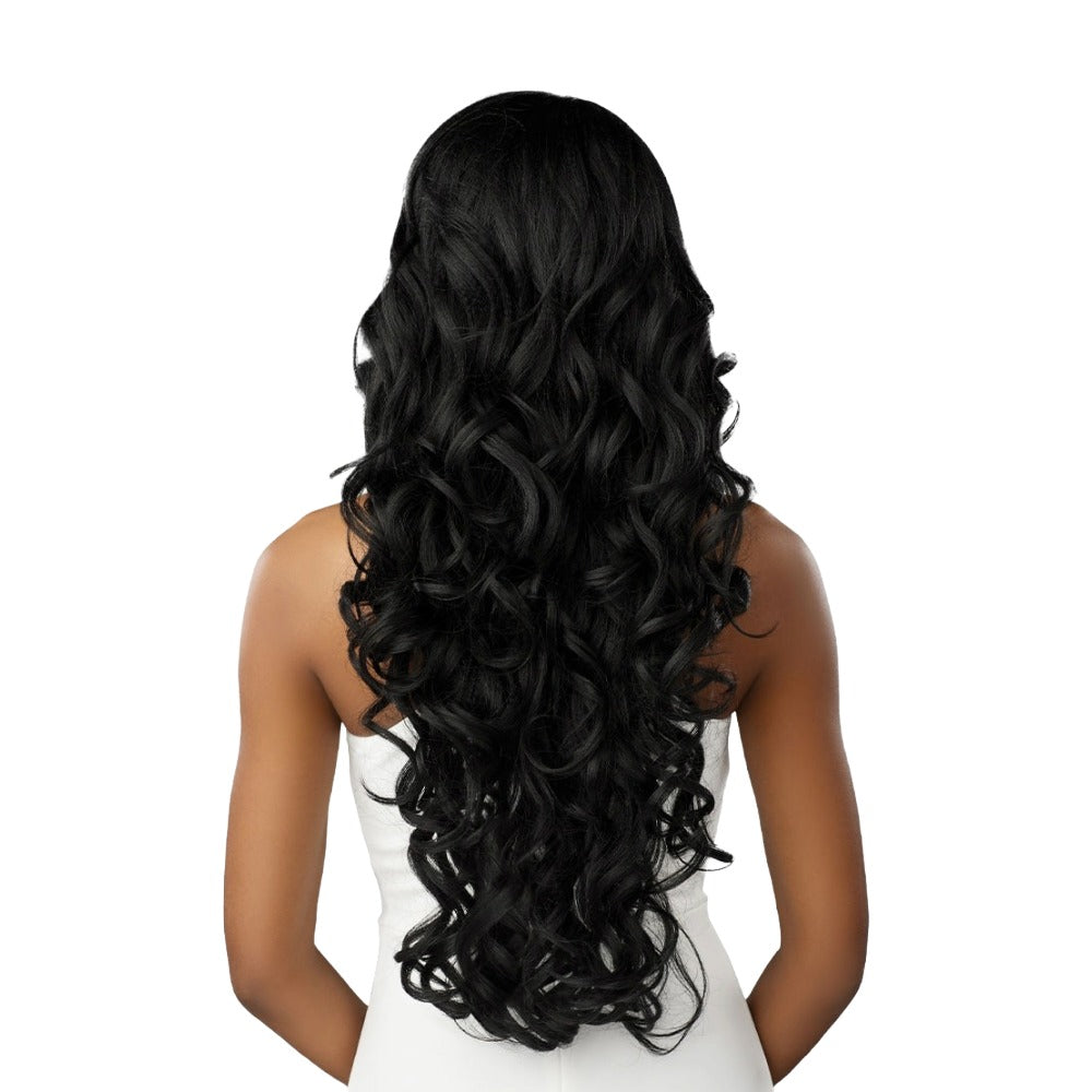 SENSATIONNEL bare lace wig 6x5 long black wavy curls cascading down back on model in white tank top