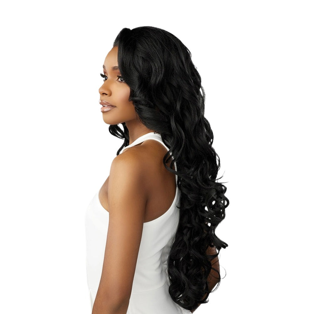 SENSATIONNEL long black wavy wig modeled on woman showcasing bare lace wig 6x5 with natural hairline