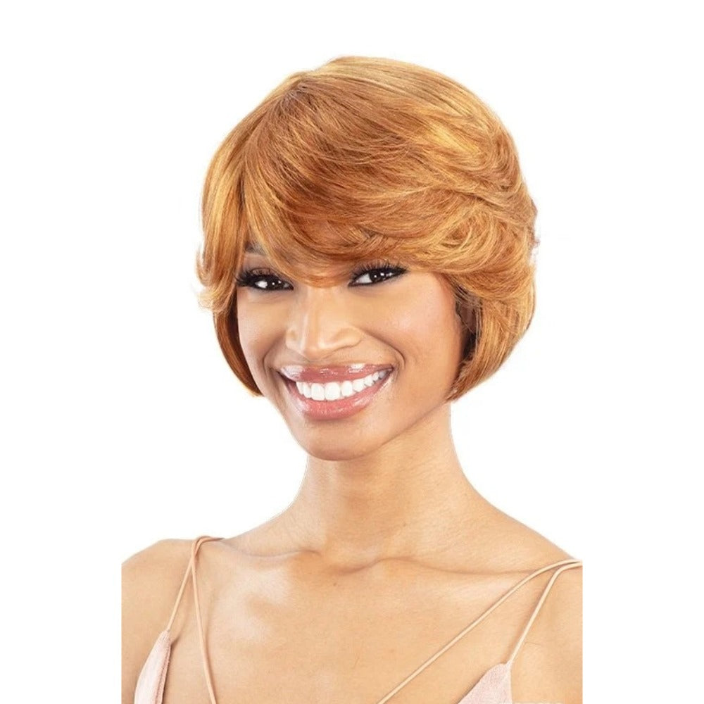 SHAKE N GO 100% human hair wig short honey blonde layered bob with side swept bangs on smiling model