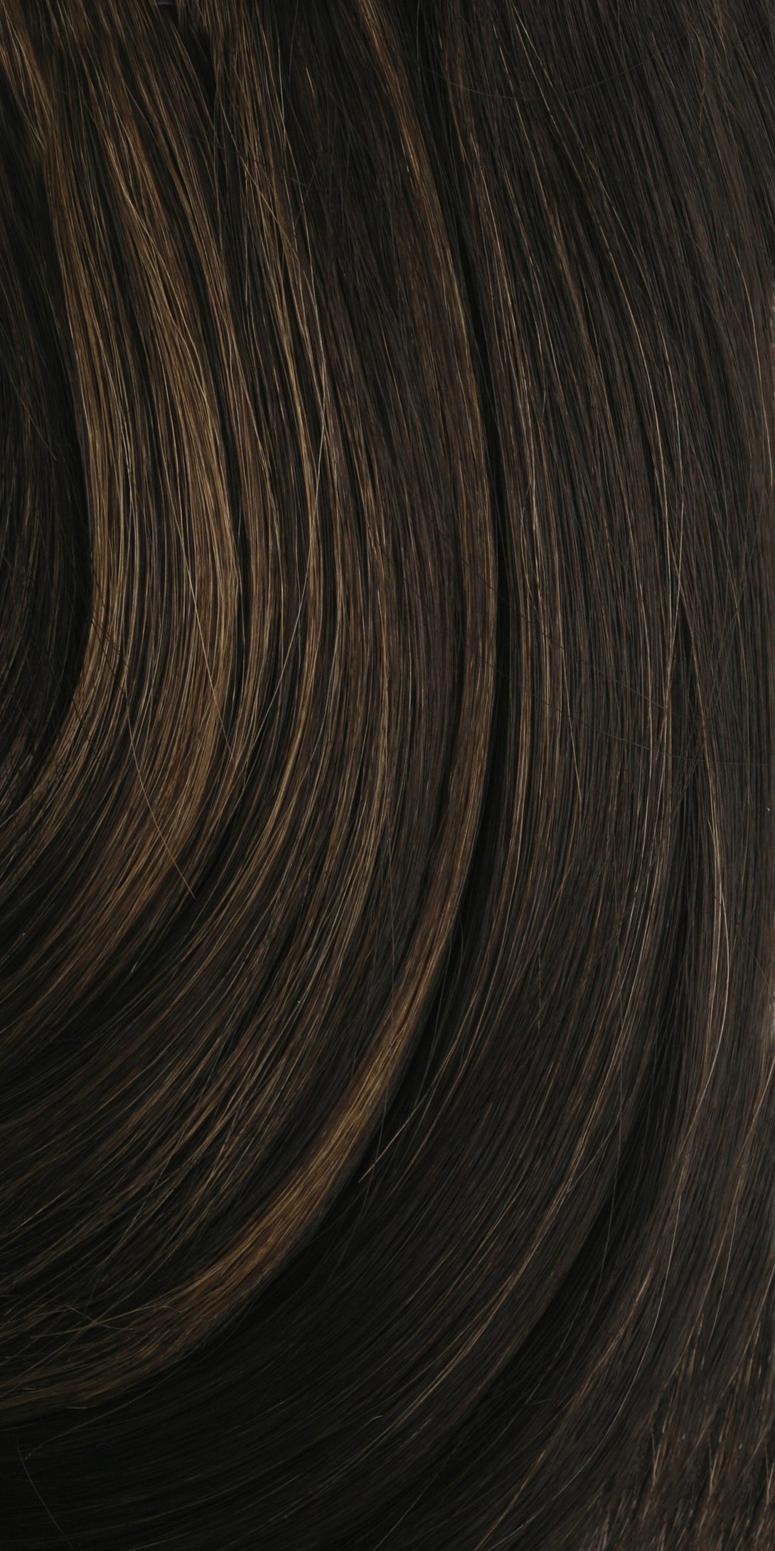 SHAKE N GO golden human hair wig close up showing dark brown strands with subtle golden highlights and smooth texture