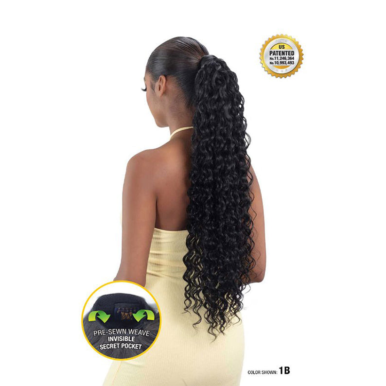 SHAKE N GO Spanish curl ponytail extension in natural black on woman with long curly hair