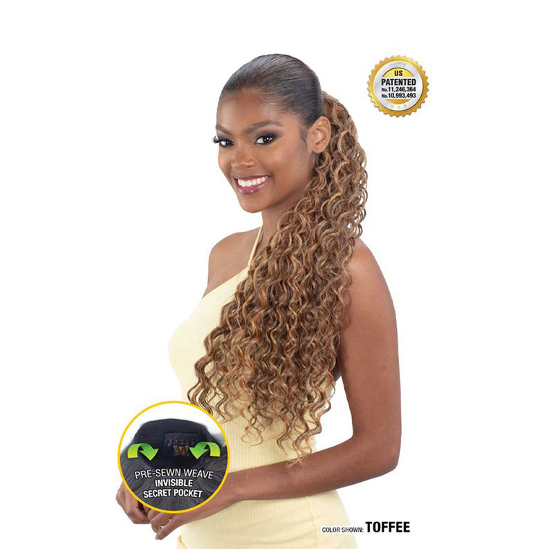 Shake N Go Spanish curl ponytail extension in toffee worn by woman with long curly hair