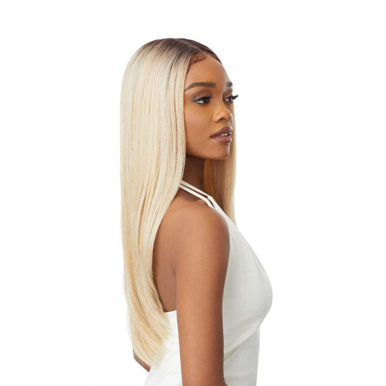 OUTRE synthetic lace front wig blonde long straight with dark roots sleek side part on model wearing white dress