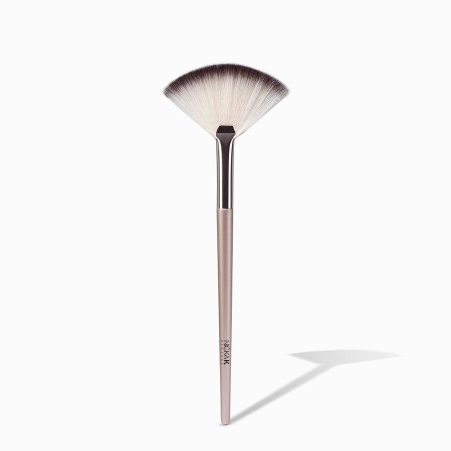 NICKA K makeup fan brush with soft ombre bristles and rose gold handle for highlighting precision