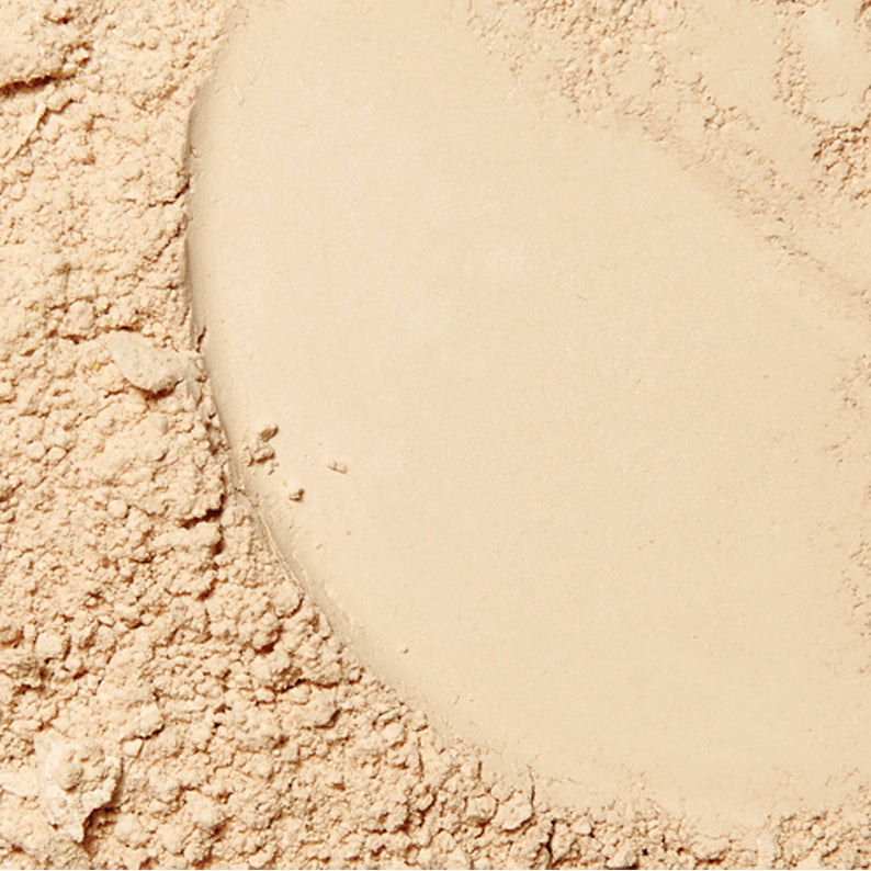 ABSOLUTE NEW YORK hd flawless setting powder close up beige loose powder pan with scattered dust