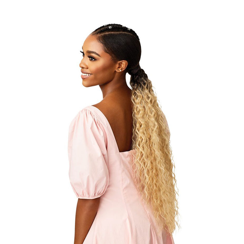 OUTRE synthetic wrap pony half wig long ombre blonde curly ponytail over sleek braided roots on model in pink dress