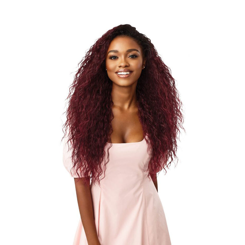 OUTRE synthetic wrap pony half wig burgundy long curly hair with dark roots on smiling model
