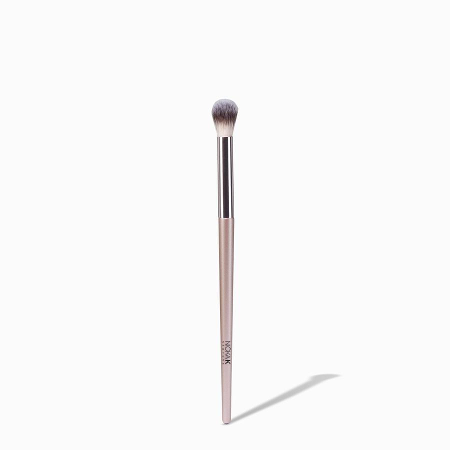 NICKA K blending eyeshadow brush with tapered soft bristles and rose gold handle for seamless crease blending