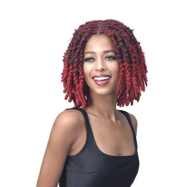 Bobbi Boss butterfly locs wig burgundy shoulder length bob on smiling model with center part textured locs