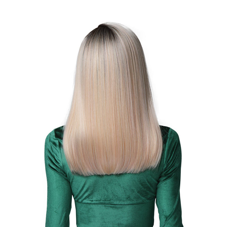 Back view of Bobbi Boss HD frontal lace wig platinum blonde with dark roots blunt shoulder length on model in green top