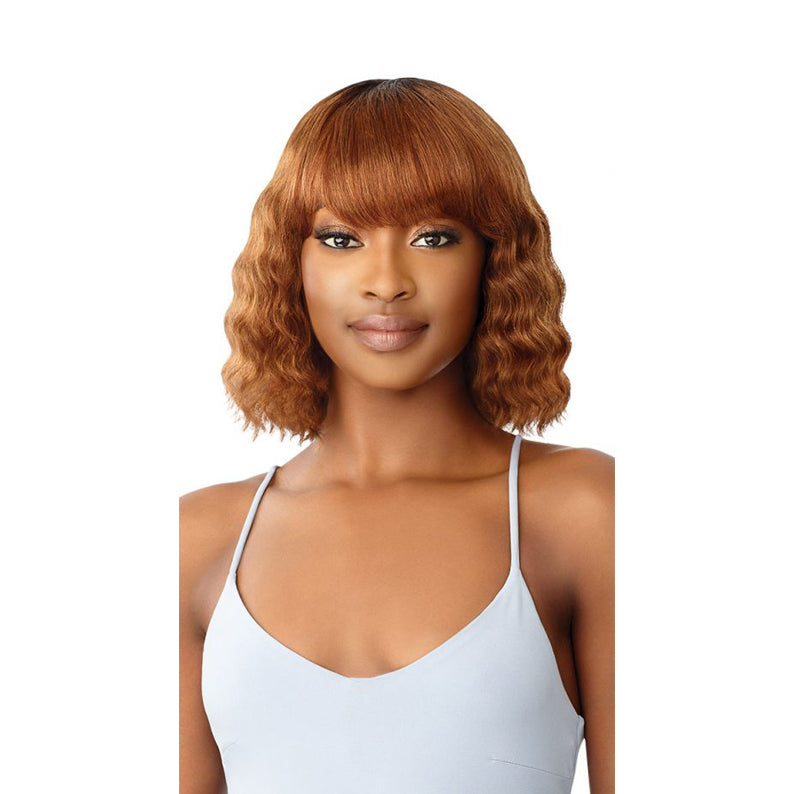 OUTRE Duby wig 100% human hair chestnut wavy bob with blunt bangs on model shoulder length style