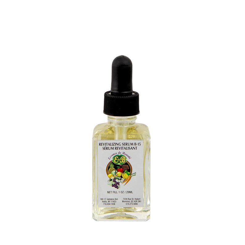 ESSENCE DE BEAUTE revitalizing facial serum in clear glass dropper bottle with light yellow oil