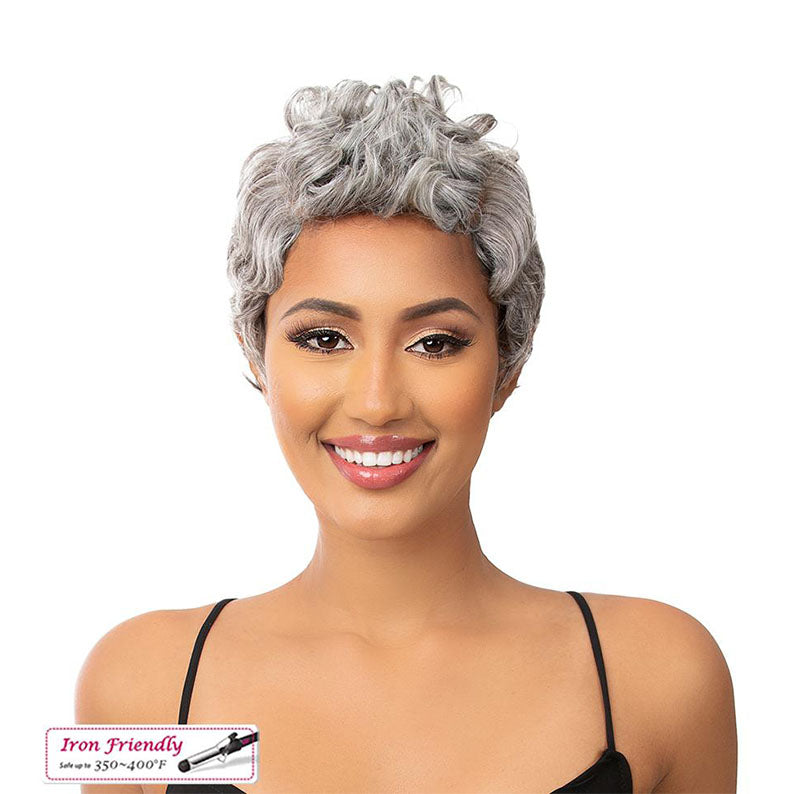 ITS A WIG premium synthetic wig short silver gray curly pixie on smiling model iron friendly and heat safe