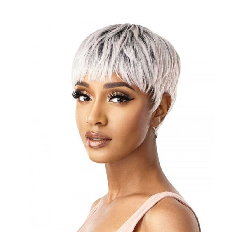 OUTRE synthetic short white wig pixie cut with textured bangs on model for trendy everyday wear