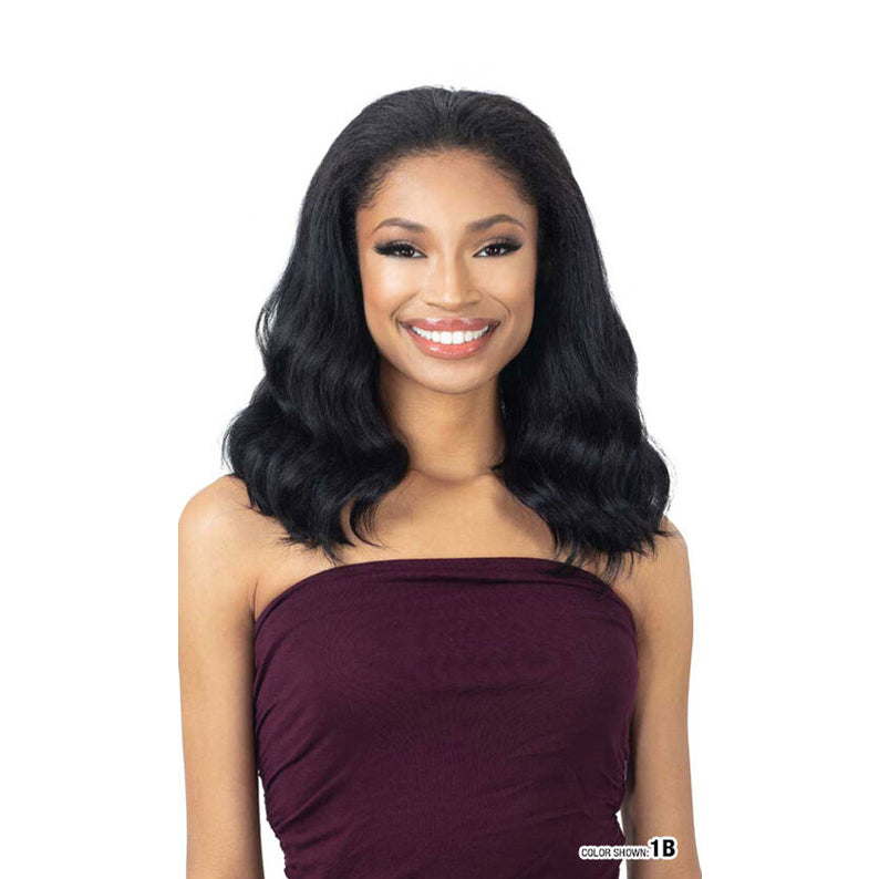 SHAKE N GO natural pressed waves half wig black shoulder length waves on smiling model with center part