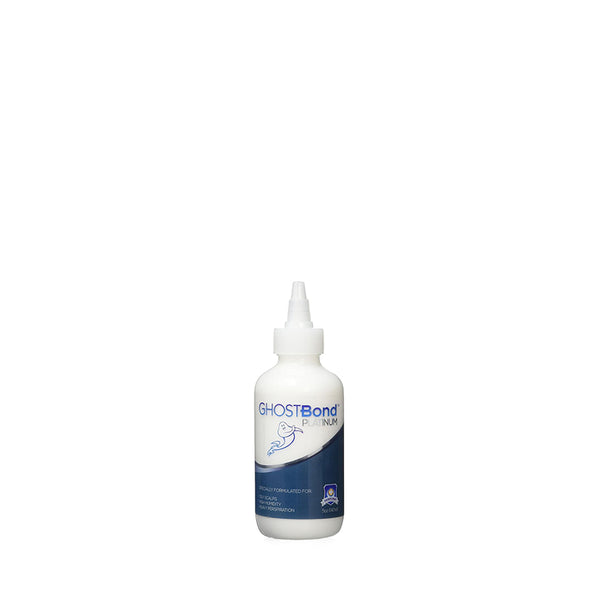 Bottle of Ghostbond Platinum wig adhesive white squeeze bottle with applicator tip for lace wigs
