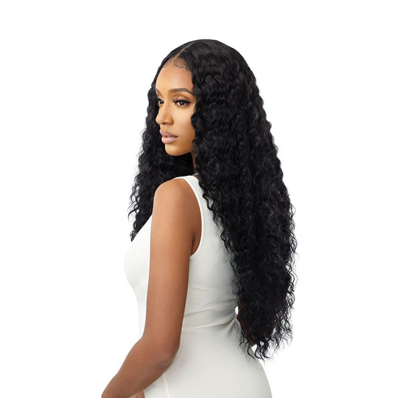 OUTRE 28 inch lace front wig in natural black deep wave on model with middle part and natural hairline