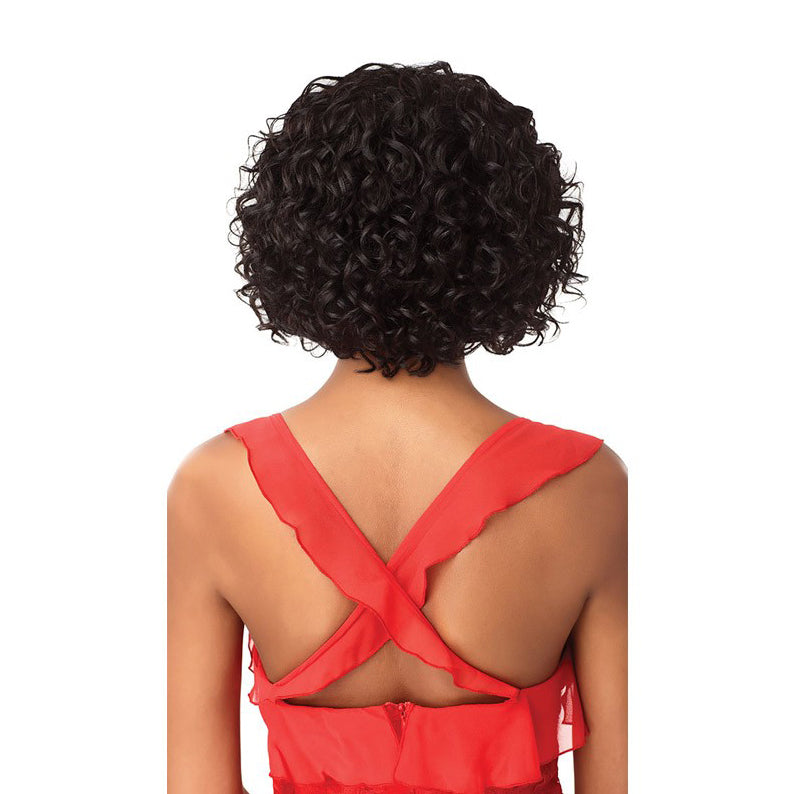 OUTRE 10 inch unprocessed human hair wig short dark curly bob shown from back on model