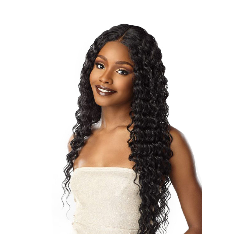 SENSATIONNEL Butta Lace Unit 15 wig long deep wave black lace front center part on smiling model