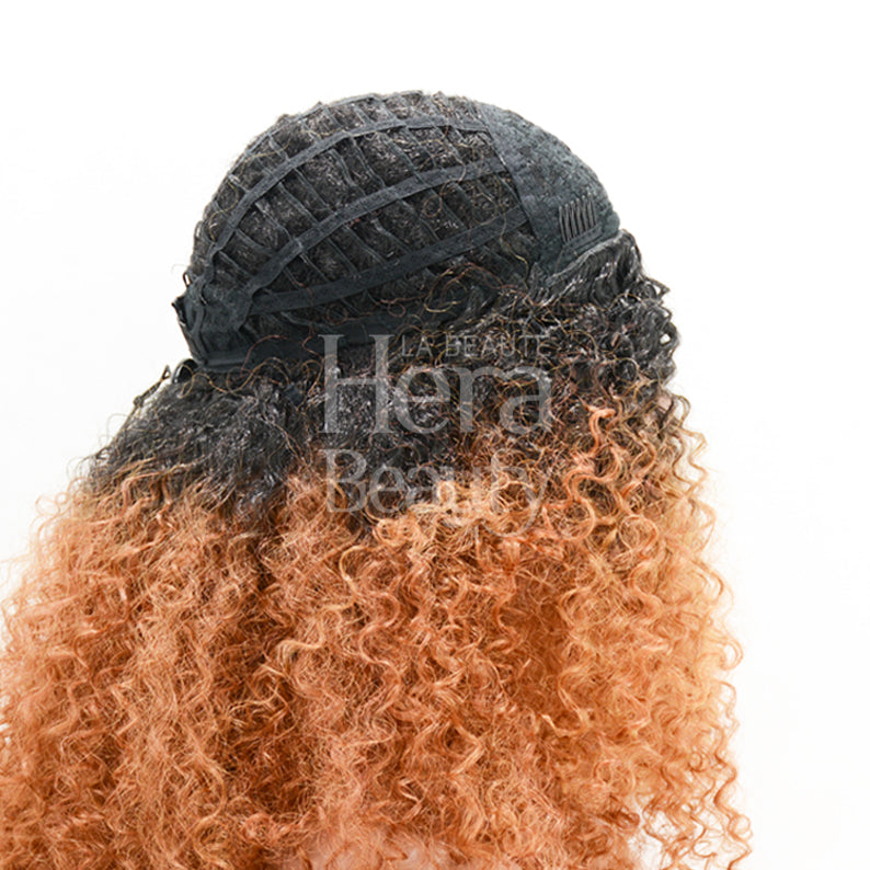 SENSATIONNEL instant up and down ponytail wig back view showing black cap and curly ombre copper hair
