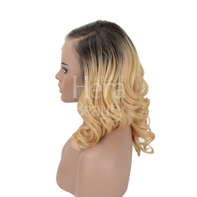 OUTRE shoulder length blonde ombre wig on mannequin with side part and melted hairline lace front wig