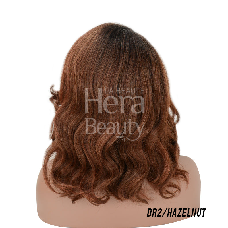 OUTRE 14 inch lace front wig synthetic in DR2 Hazelnut wavy shoulder length back view on mannequin