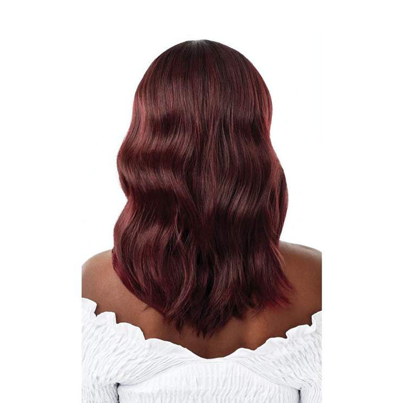 OUTRE 16 inch lace front wig in deep burgundy with soft wavy texture on a model