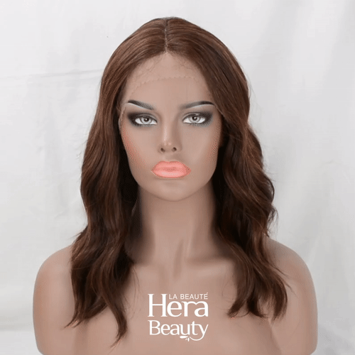 OUTRE 16 inch lace front wig with natural brown waves on mannequin head