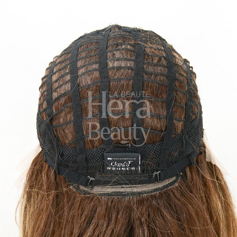 Butta Lace Unit 14 wig interior view showing SENSATIONNEL cap with brown wefted hair and adjustable straps