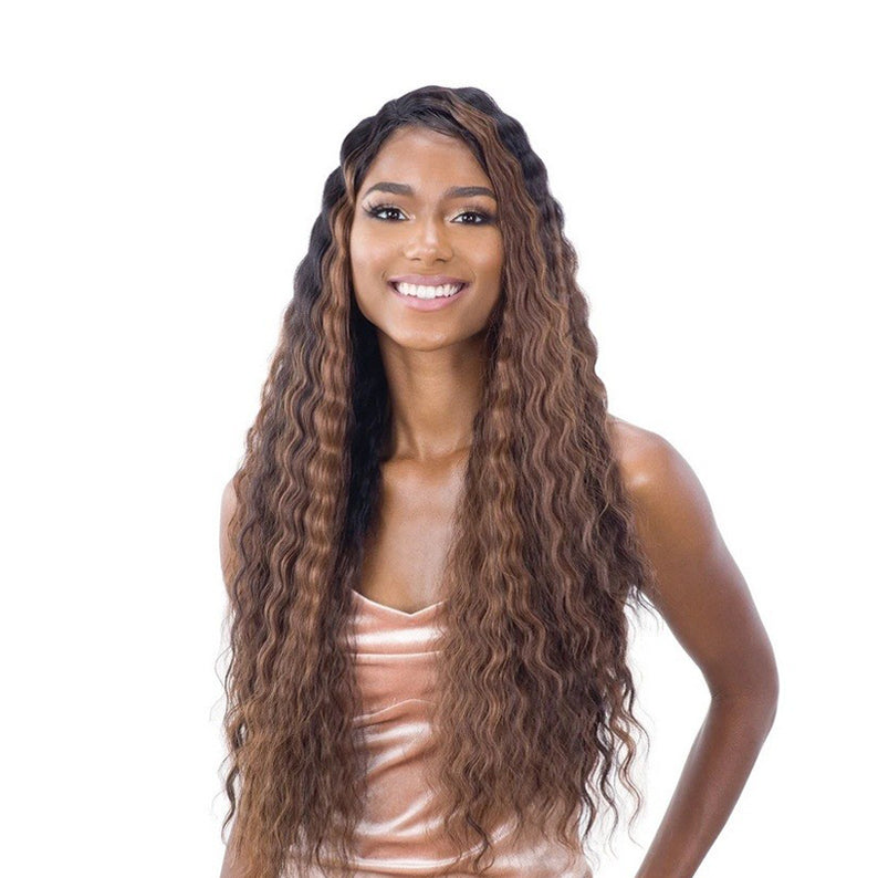 SHAKE N GO deep waver lace front wig in long brown ombre on smiling model with natural center part and soft waves