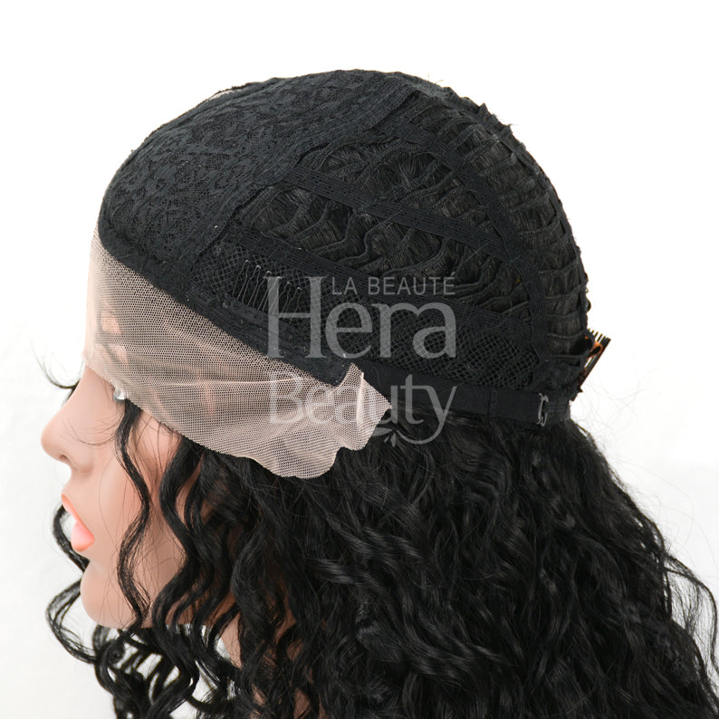 Mannequin wearing HD lace wig Catalina with visible lace front cap and long black curly hair