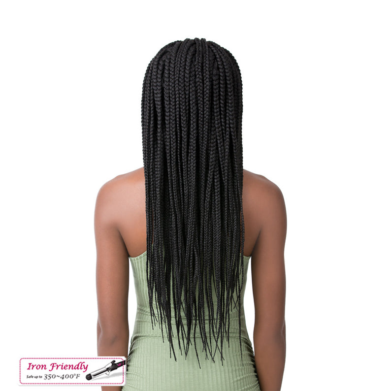 Back view of model wearing long black lace front micro cornrow wig with iron friendly braids