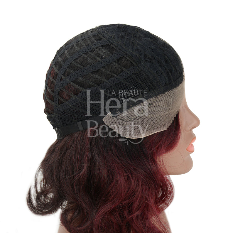 OUTRE synthetic lace front wig showing breathable open weft cap and burgundy wavy hair ends
