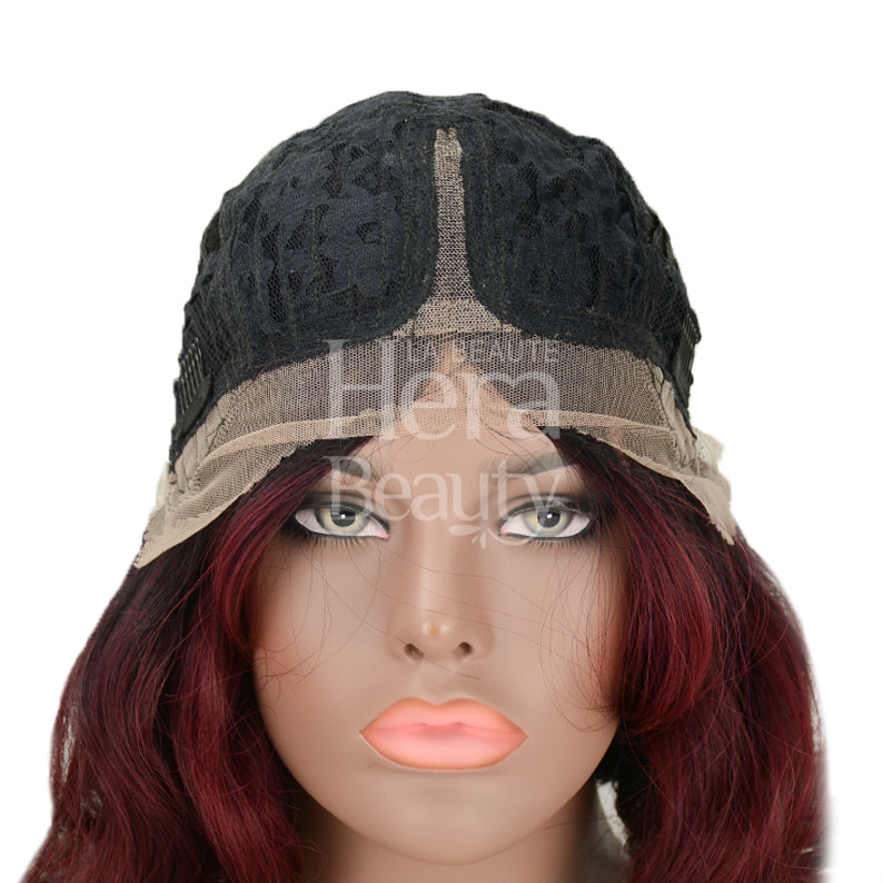 OUTRE synthetic lace front wig displayed on mannequin showing lace cap and burgundy wavy hair