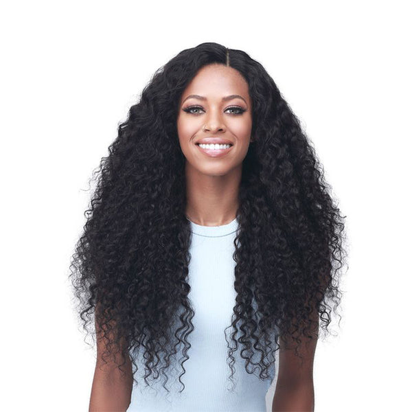 BOBBI BOSS long curly black 100% unprocessed human hair wig with natural middle part on smiling model