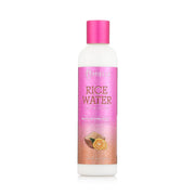 MIELLE bottle of rice water moisturizing milk for hair with pink label and coconut citrus illustration