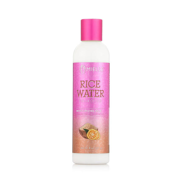 MIELLE bottle of rice water moisturizing milk for hair with pink label and coconut citrus illustration