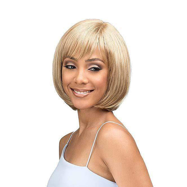 BOBBI BOSS blonde bob wig with bangs styled on woman wearing a white tank top