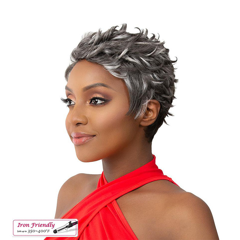 IT'S A WIG premium synthetic wig with short textured black and gray hair on model wearing red