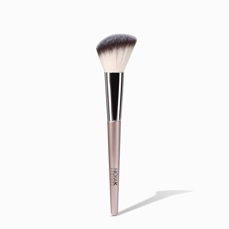 NICKA K angled contour brush with soft two tone bristles and pink handle for precise cheek sculpting