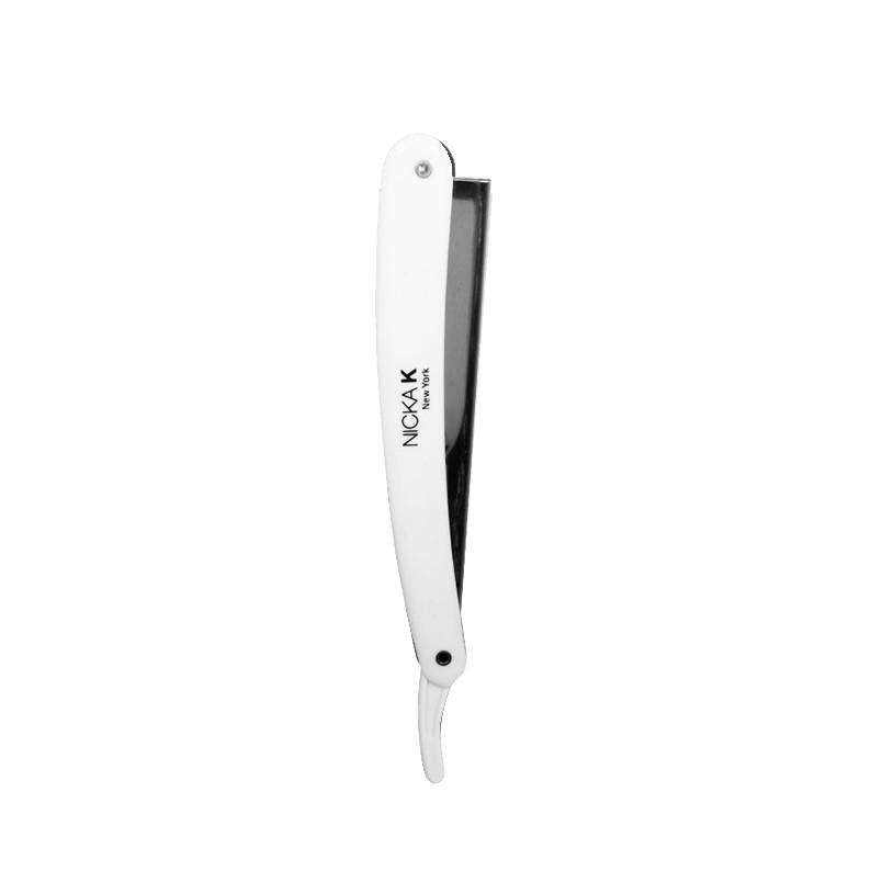 Nicka K Straight Razor for shaving with a sleek white handle for precision grooming