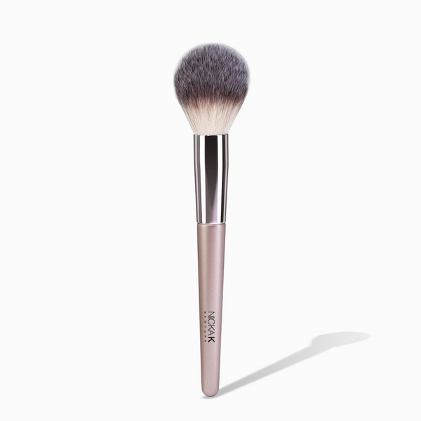 NICKA K fluffy synthetic blush brush for makeup with tapered rounded head and sleek rose gold handle