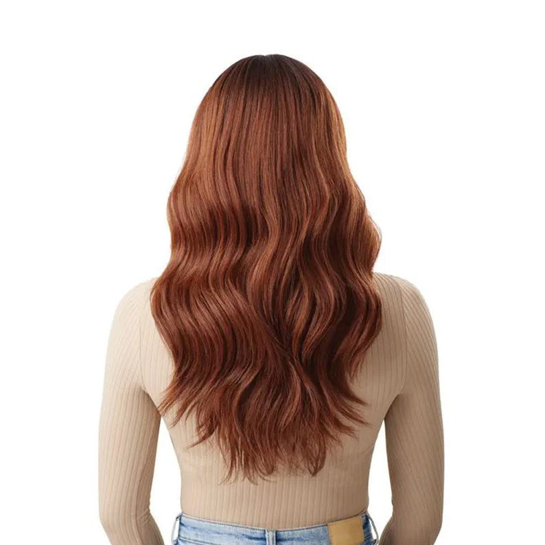 OUTRE 22 inch synthetic lace front wig in auburn copper wavy style shown from back on model wearing beige top