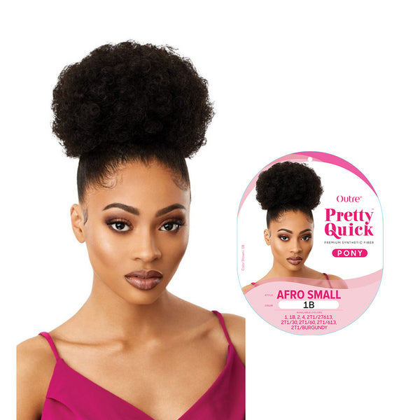 OUTRE afro puff ponytail extension in natural black shown on model with sleek high ponytail