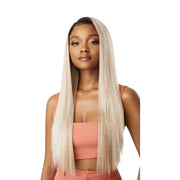 OUTRE blonde synthetic lace front wig 28 inch long straight center part on model wearing coral crop top