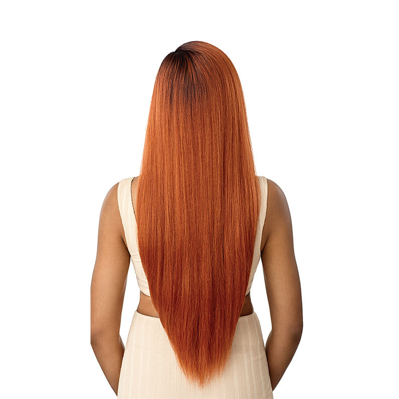 OUTRE lace front synthetic wig long straight auburn with dark roots shown from back on model