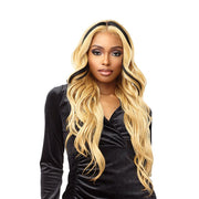 Model wearing Sensationnel Vice Unit 12 lace front wig long wavy honey blonde with black streaks