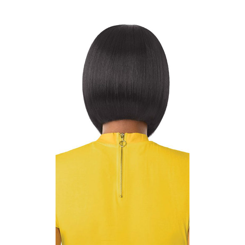 Ear length sleek black bob OUTRE synthetic lace front wig shown from back on model in yellow top