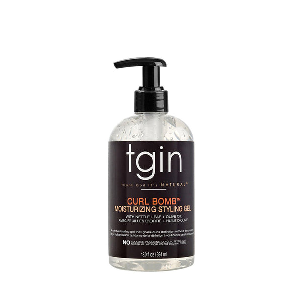 Clear pump bottle of tgin curl bomb styling gel moisturizing formula for defined curly hair