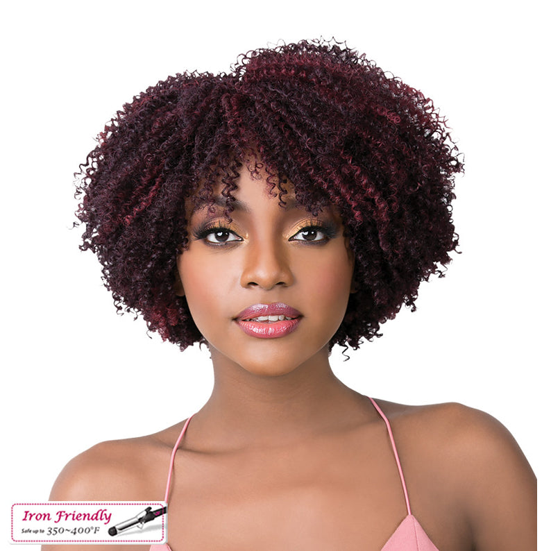 Model wearing burgundy short coily synthetic wig with tight curls and soft face framing bangs